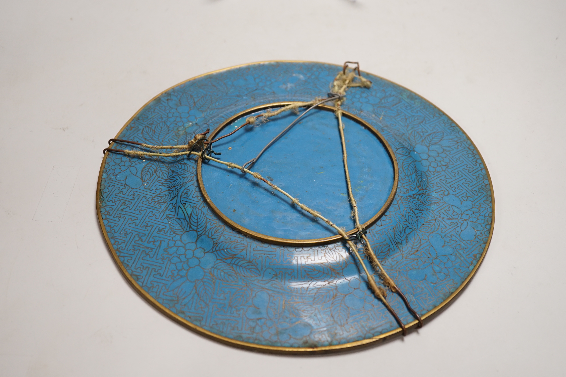 A Chinese Jiaqing period cloisonné enamel dish on a turquoise ground with floral decoration, 27.5cm